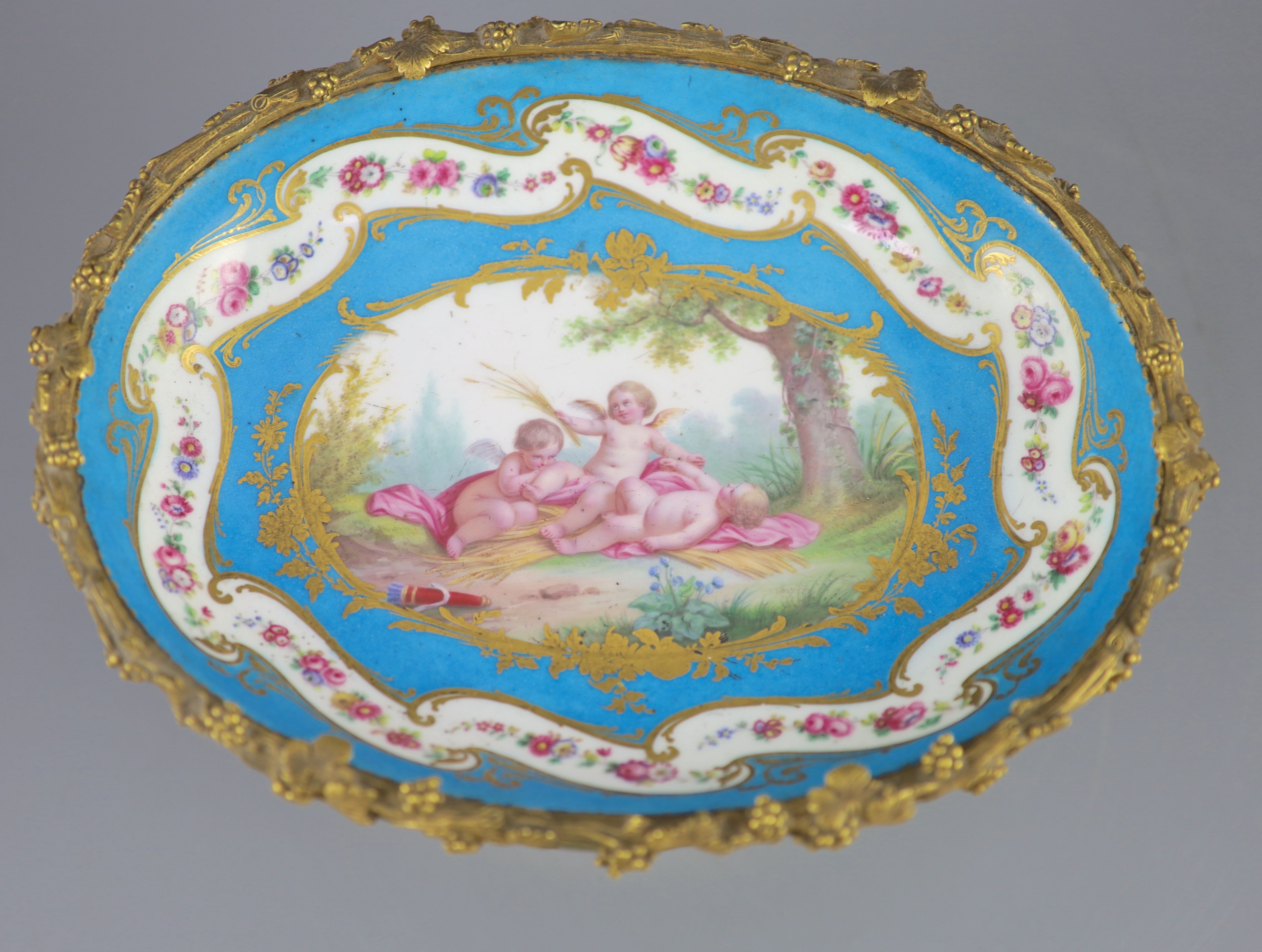 A French Sevres style porcelain and ormolu mounted oval centrepiece dish, 19th century, 28.5cm across